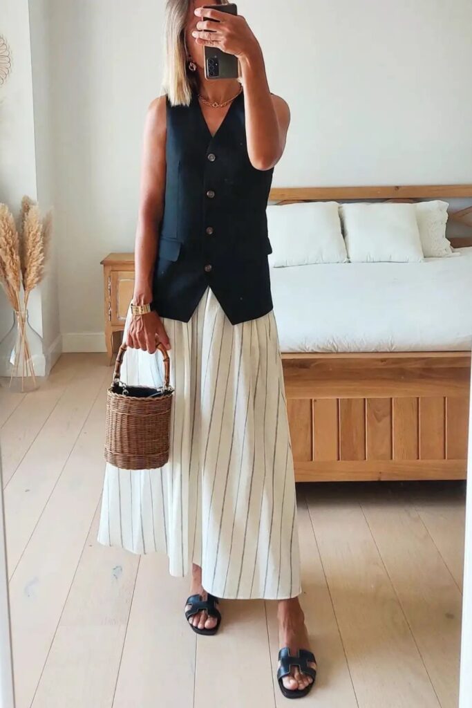 white-skirt-outfits-6-683x1024-1 Black Vest and Flowy Maxi Skirt