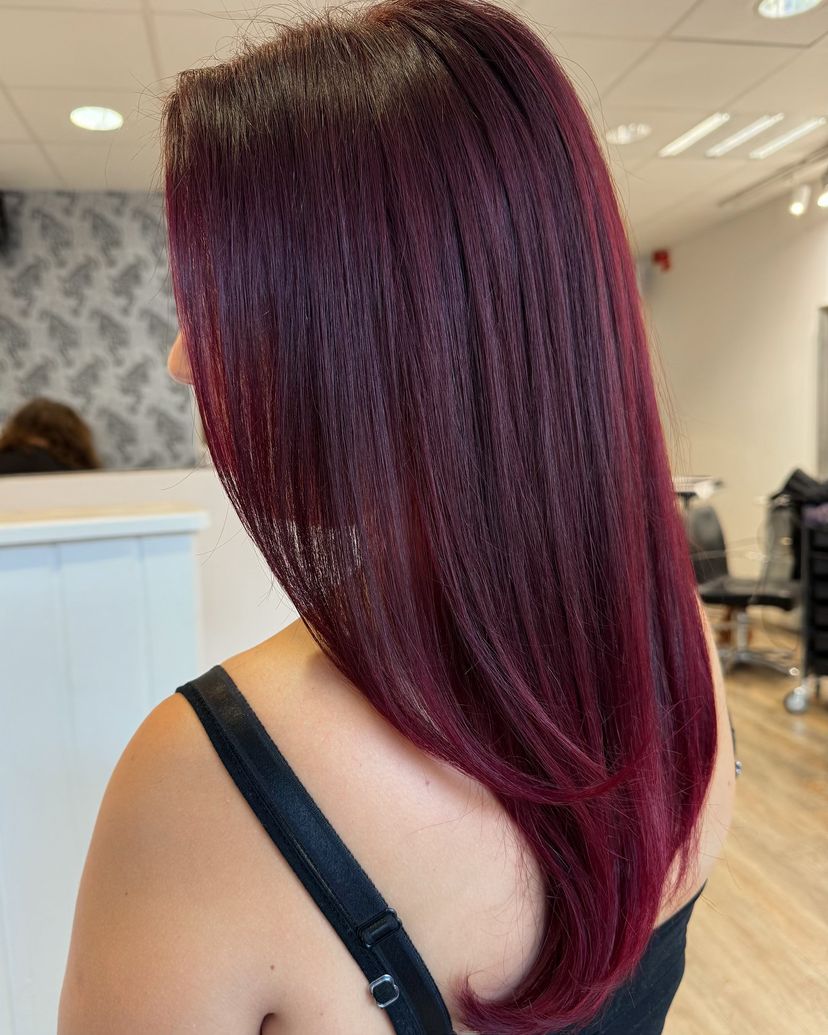 Woman with gorgeous burgundy hair color for winter.