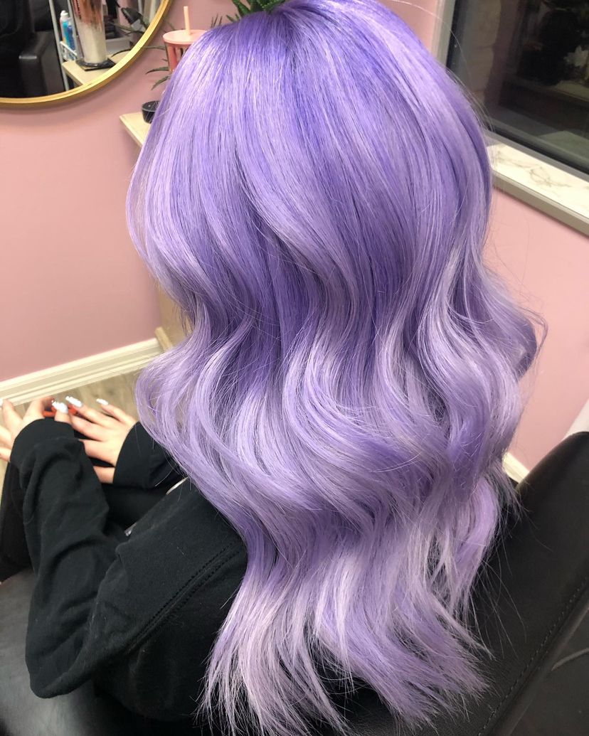 Woman with gorgeous lilac hair color for winter.
